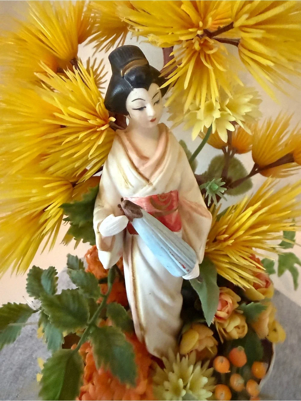 Vintage Japanese geisha figurine with artificial bonsai tree